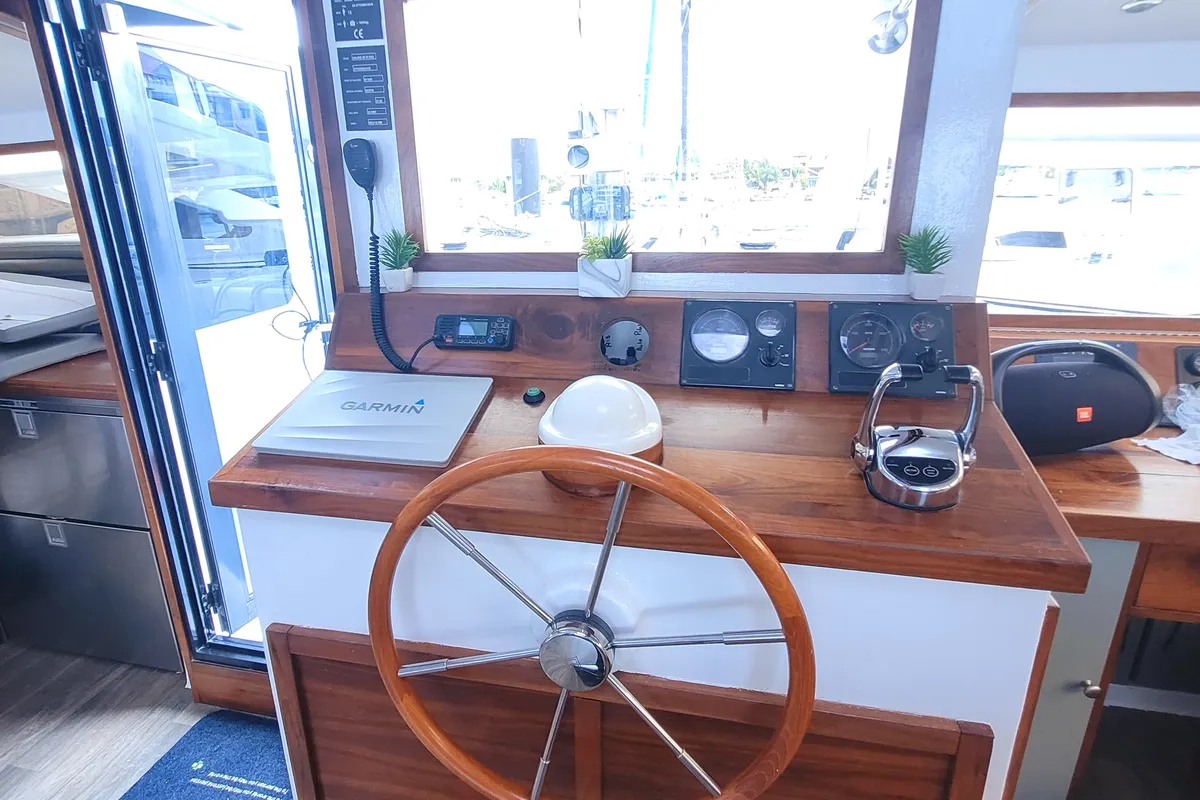 Cockpit of Valerie, a Sea-Tribe DH550 catamaran at Roche Caiman, Seychelles