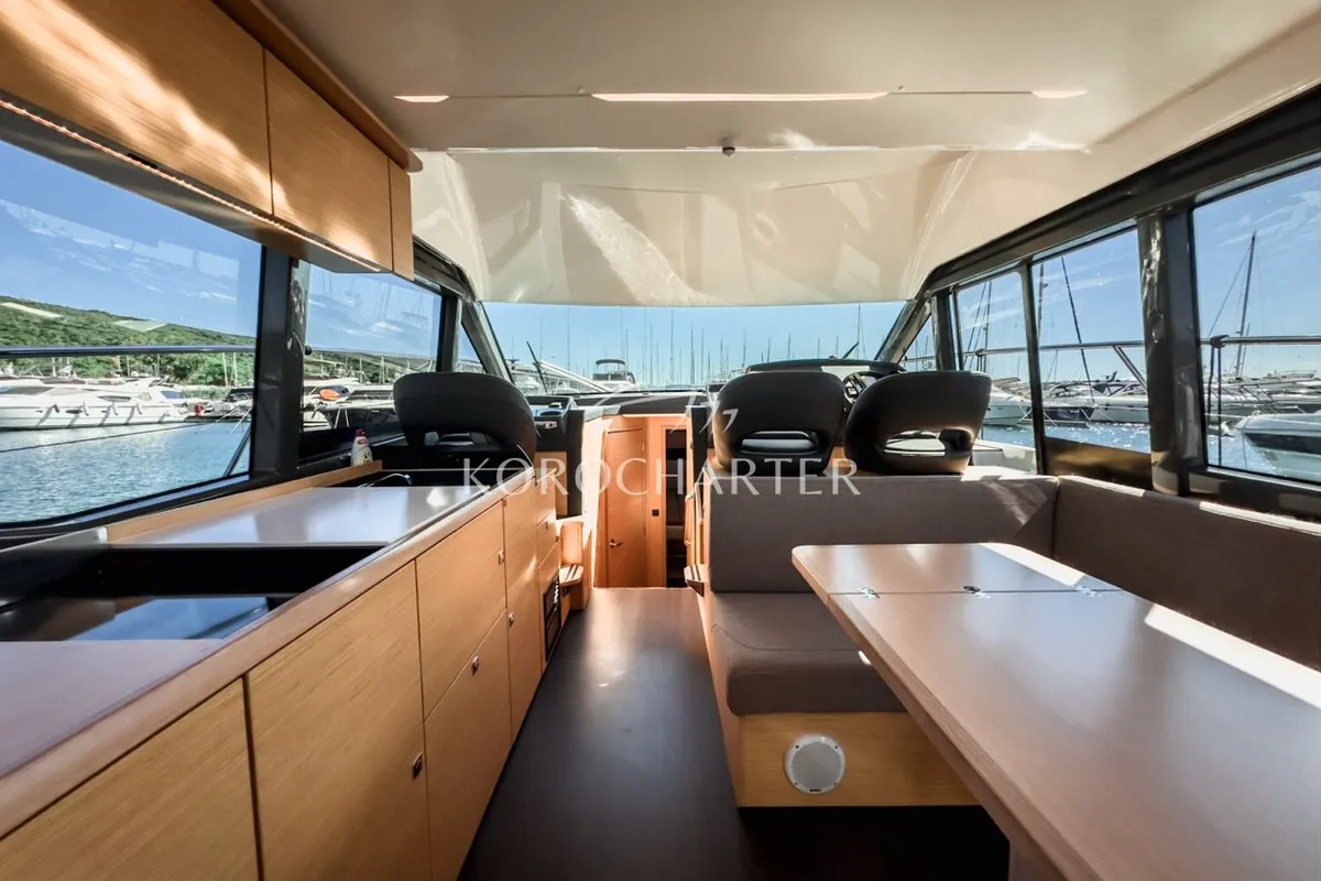 Neptun, a Bavaria R40 Fly motor yacht at Punat, Croatia