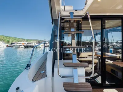 Neptun, a Bavaria R40 Fly motor yacht at Punat, Croatia