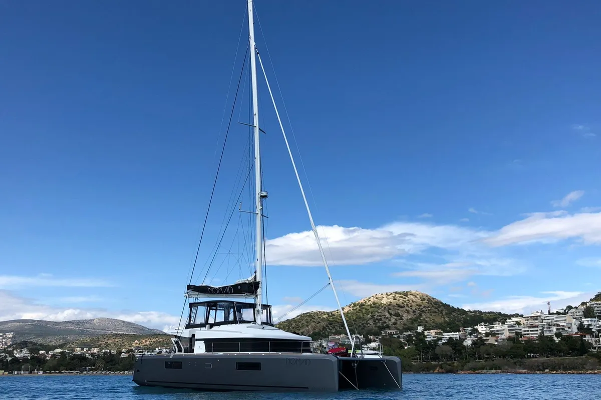 Exterior view of Nomad, a Lagoon 52 catamaran at Lavrion, Greece