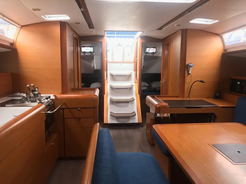 Salon of Alboran Grappa, a Jeanneau Sun Odyssey 519 sailboat at es Jonquet, Spain