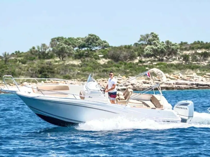 Exterior view of Cap Camarat, a Jeanneau Cap Camarat 7.5 CC motorboat at Trogir, Croatia