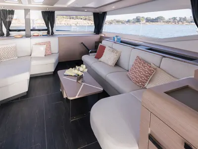 Salon of Dédé, a Fountaine Pajot Aura 51 catamaran at Hyères, France