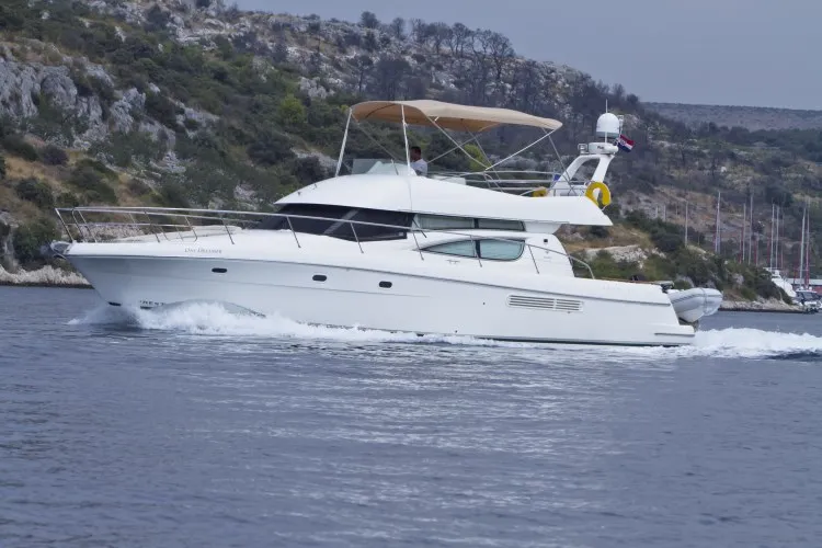Exterior view of George's, a Prestige 46 Fly motorboat at Primošten, Croatia