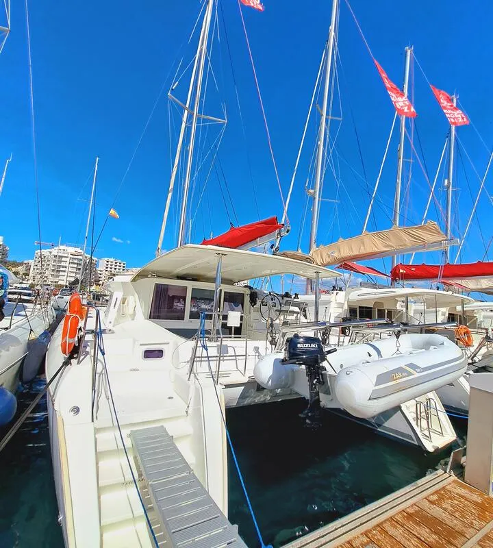 Exterior view of The Mob, a Lagoon 421 catamaran at Sant Antoni de Portmany, Spain