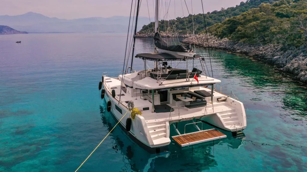 Exterior view of Capella, a Lagoon 52 F catamaran at Fethiye, Turkey