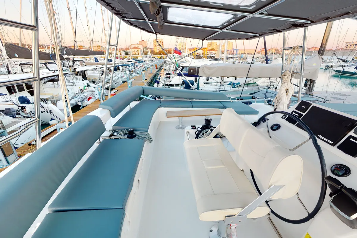 Cockpit of Vittoria, a Dufour 48 Catamaran catamaran at Olbia, Italy
