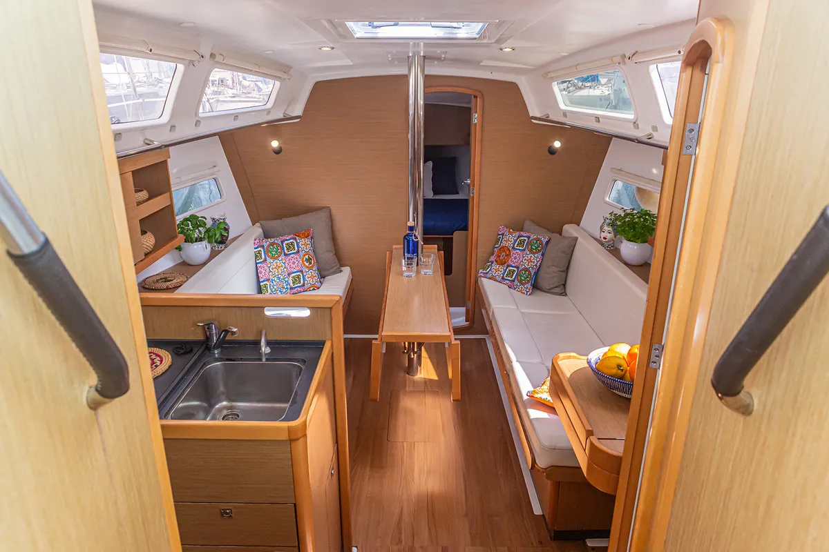 Salon of Hija del Viento, a Jeanneau Sun Odyssey 319 sailboat at Palermo, Italy