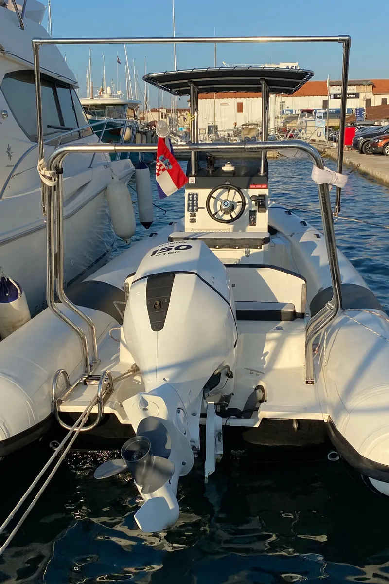 Exterior view of Falkor, a Falkor 22 motorboat at Grad Trogir, Croatia