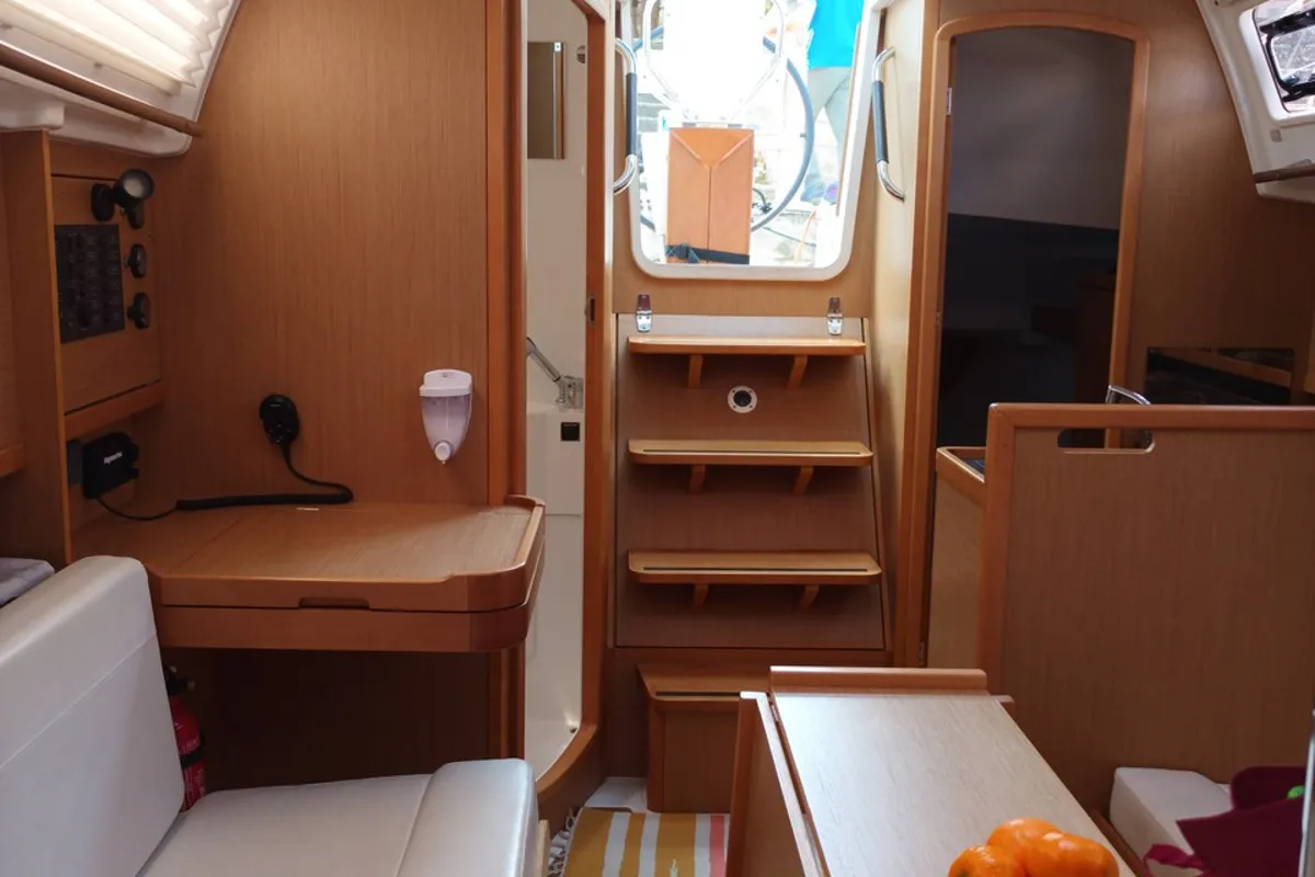 Salon of Pupatella, a Jeanneau Sun Odyssey 319 sailboat at Tonnarella, Italy