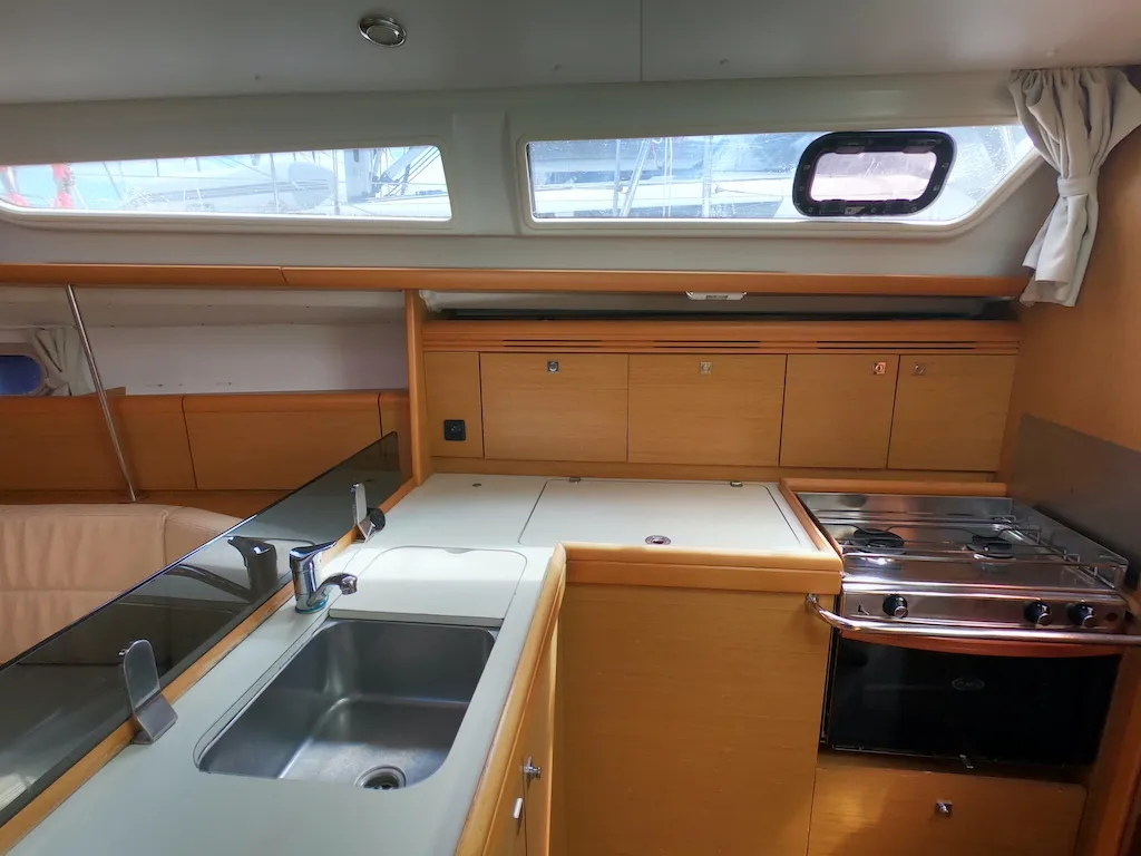 Galley of Bliksem, a Jeanneau Sun Odyssey 36i Performance sailboat at Olbia, Italy