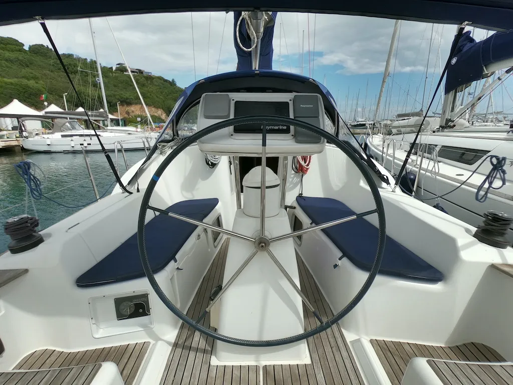 Cockpit of Bliksem, a Jeanneau Sun Odyssey 36i Performance sailboat at Olbia, Italy