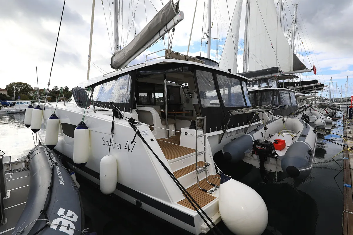 Exterior view of Aquarius, a Fountaine Pajot Saona 47 Quintet catamaran at Grad Biograd na Moru, Croatia