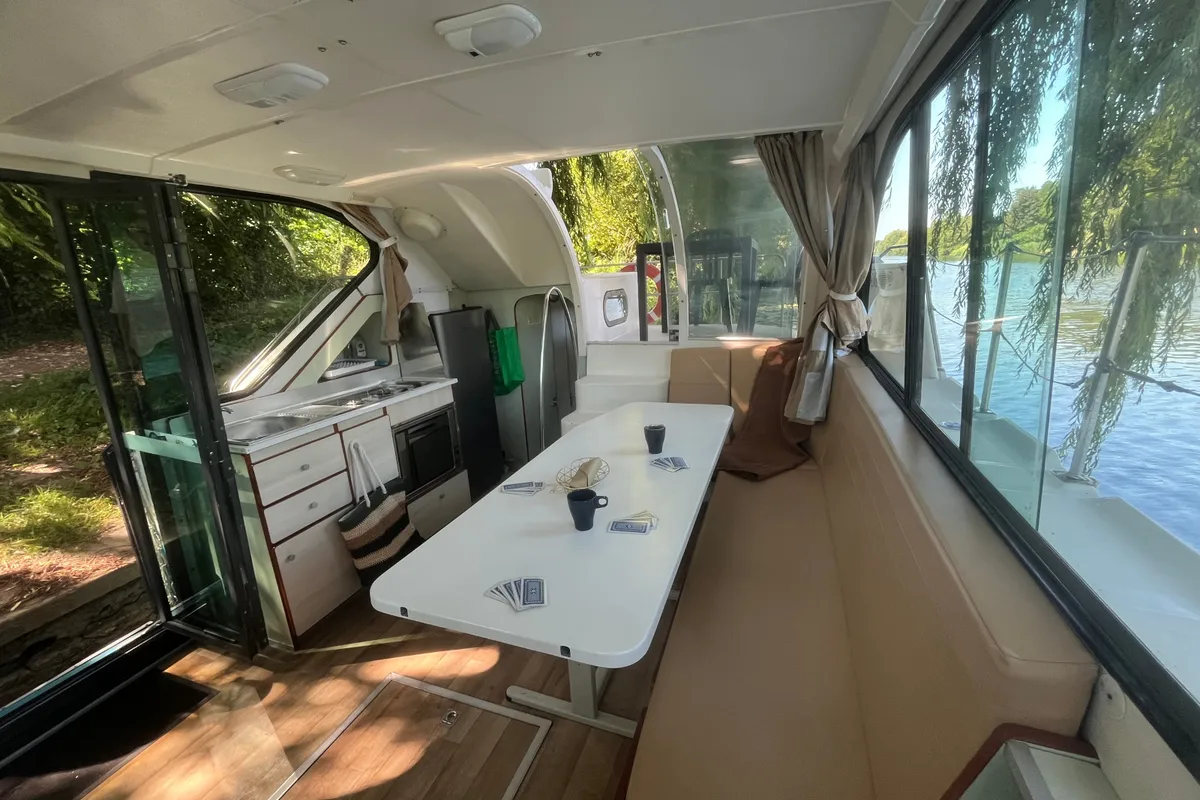 Salon of Adagio, a Nicols Confort 1100 motorboat at Grez-Neuville, France
