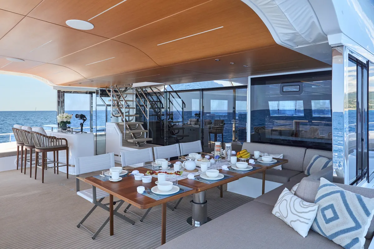 Deck of ATRAVERSIA, a Gulet x-reuse catamaran at Imperia, Italy