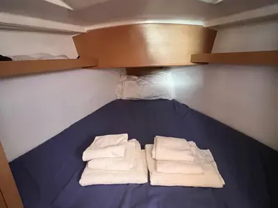 Cabin on Lazzarone, a Jeanneau Sun Odyssey 319 sailboat at Cannigione, Italy