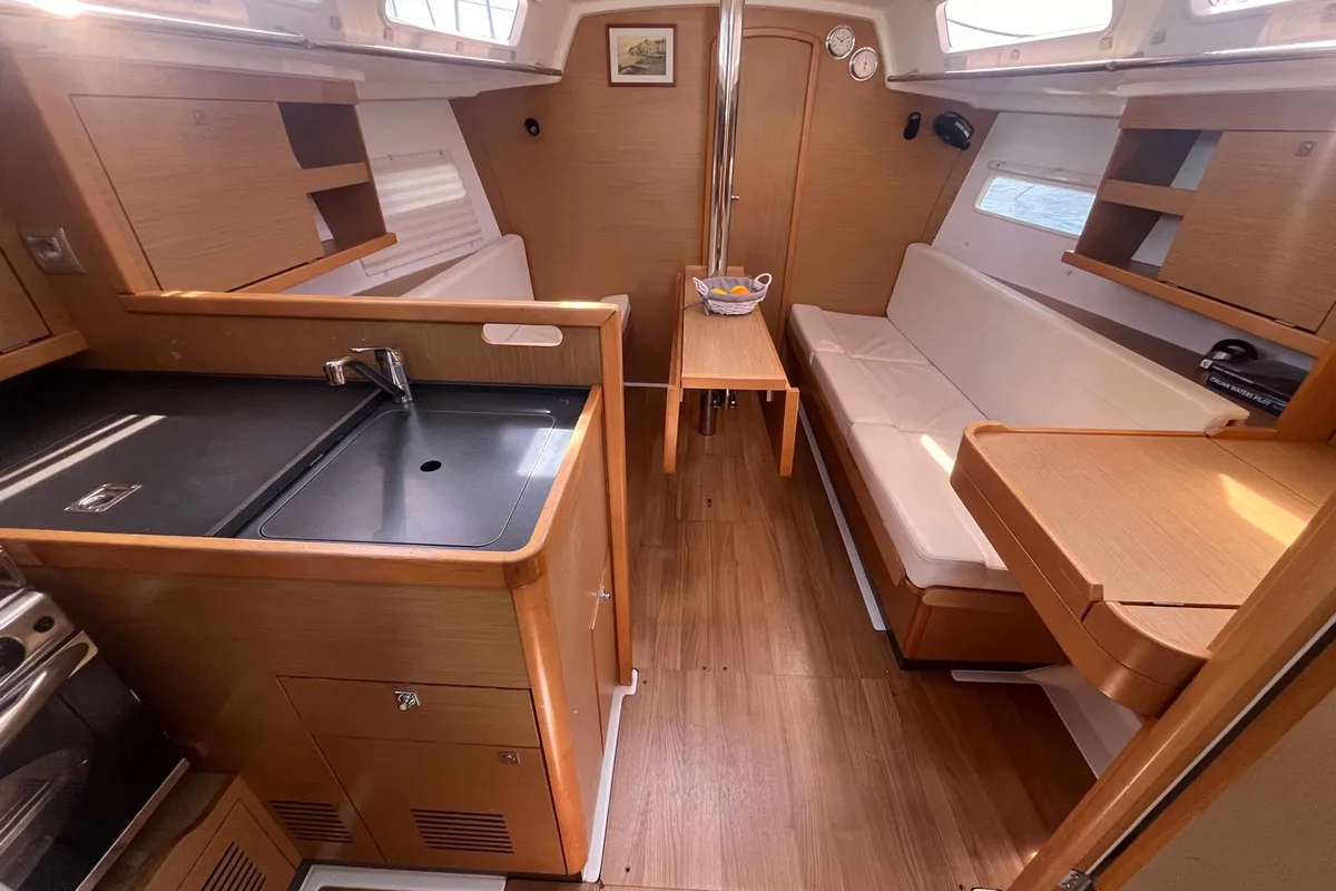Salon of Lazzarone, a Jeanneau Sun Odyssey 319 sailboat at Cannigione, Italy