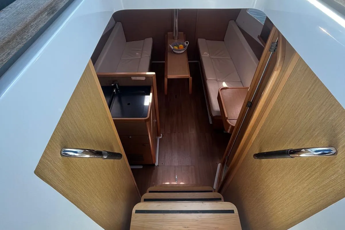 Salon of Lazzarone, a Jeanneau Sun Odyssey 319 sailboat at Cannigione, Italy