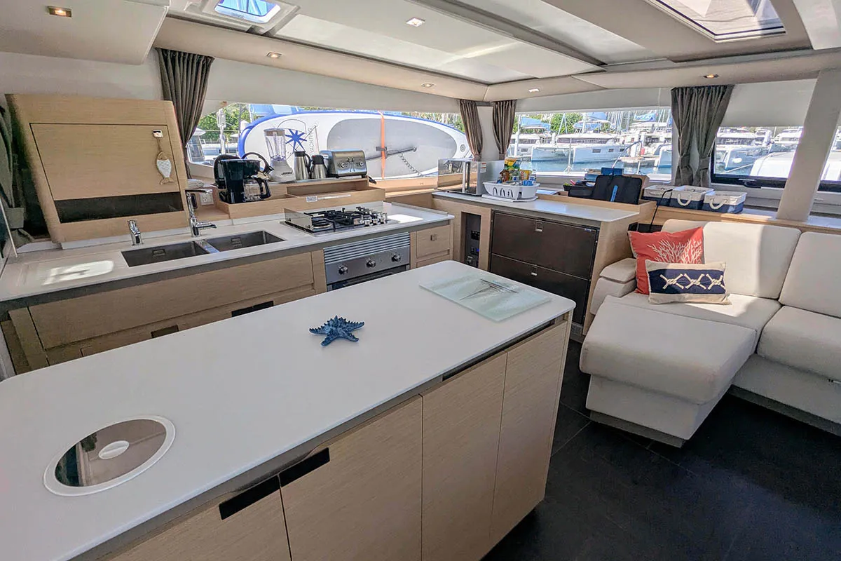 Salon of V Circle, a Fountaine Pajot Aura 51 catamaran at Roche Caiman, Seychelles
