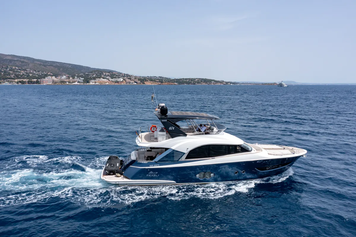 Exterior view of Five weeks, a Beneteau Monte Carlo 66 motor yacht at Castellammare di Stabia, Italy