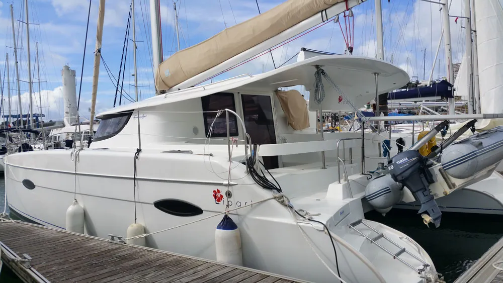 Exterior view of Curieuse, a Fountaine Pajot Lipari 41 catamaran at Kerners, France
