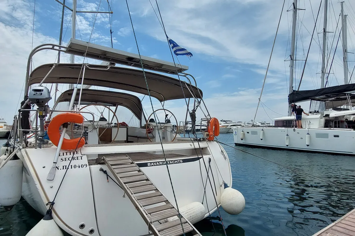 Exterior view of Little Secret, a Bavaria 55 Cruiser sailboat at Athens, Greece