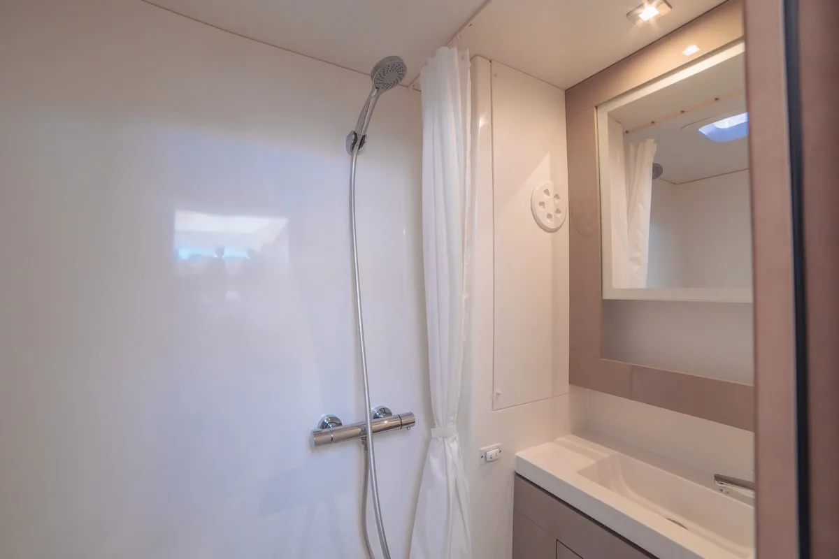 Head on Blue Mandarin, a Fountaine Pajot Tanna 47 catamaran at Olbia, Italy