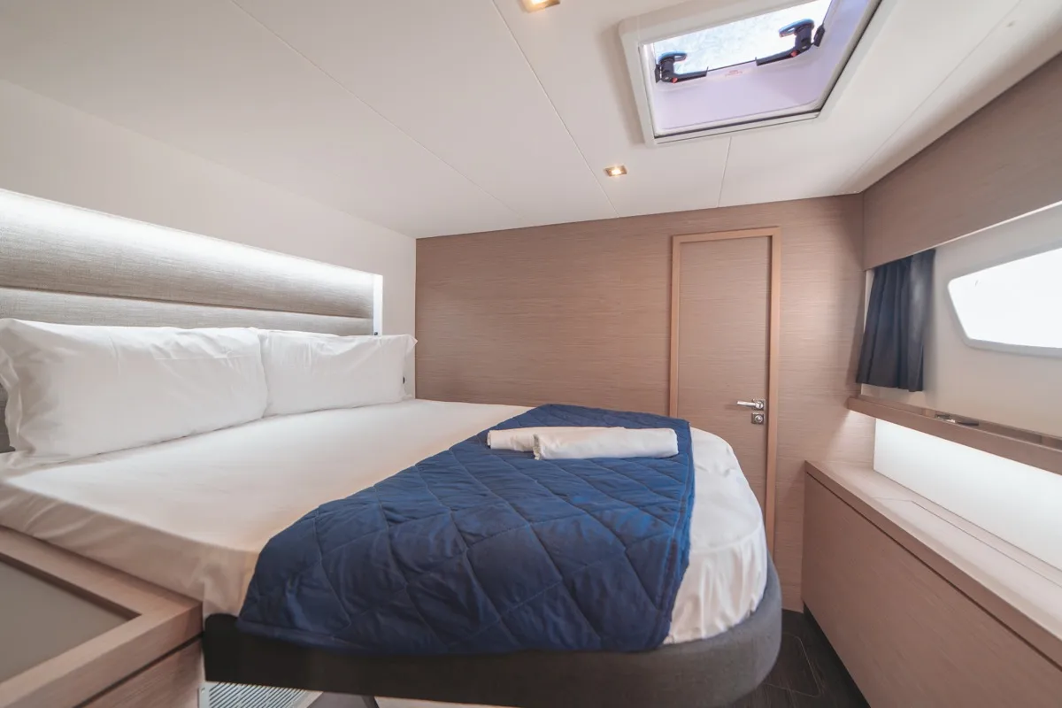 Cabin on Blue Mandarin, a Fountaine Pajot Tanna 47 catamaran at Olbia, Italy
