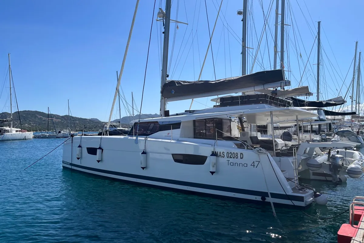 Exterior view of Blue Mandarin, a Fountaine Pajot Tanna 47 catamaran at Olbia, Italy