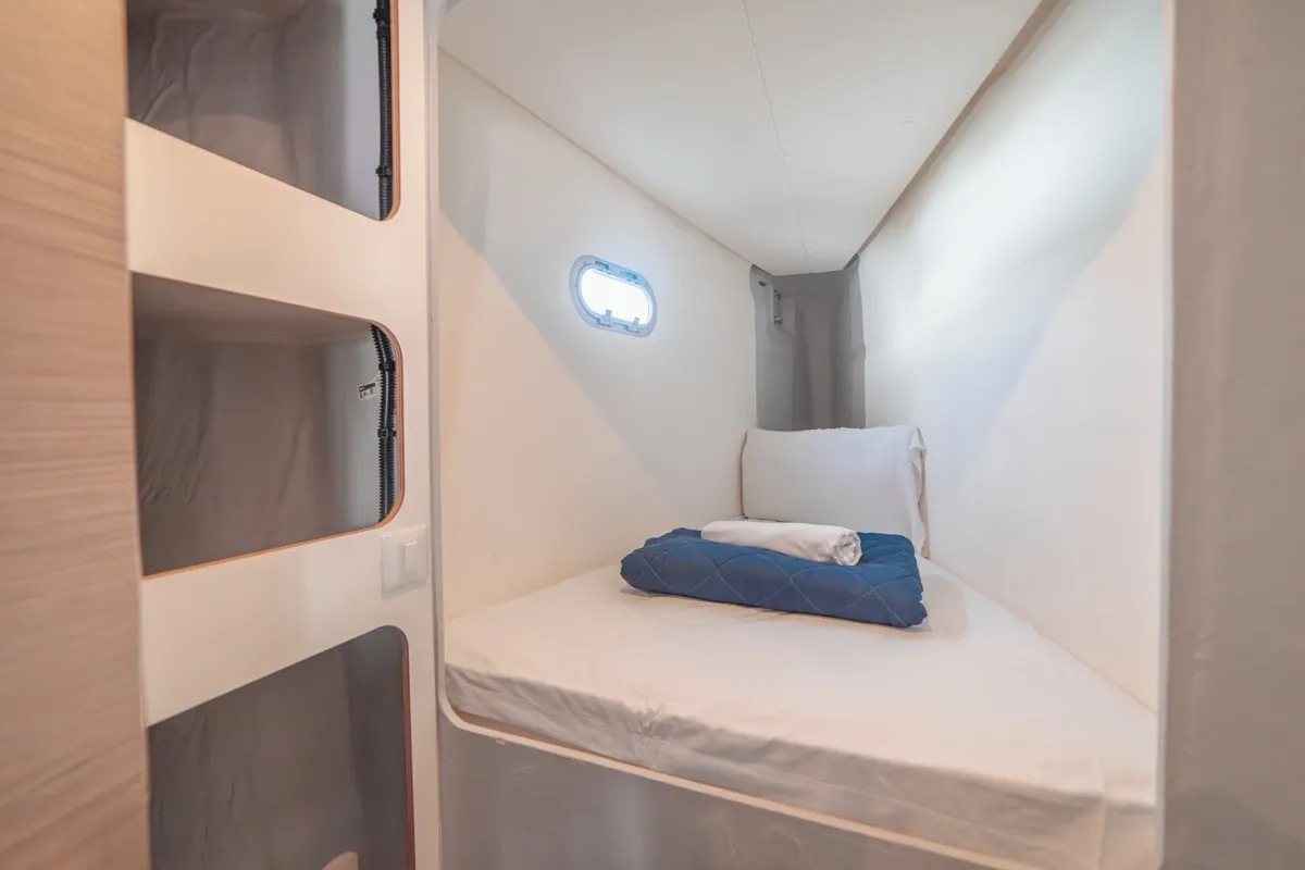 Cabin on Blue Mandarin, a Fountaine Pajot Tanna 47 catamaran at Olbia, Italy