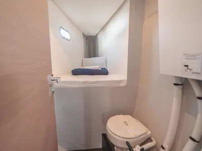Cabin on Blue Mandarin, a Fountaine Pajot Tanna 47 catamaran at Olbia, Italy