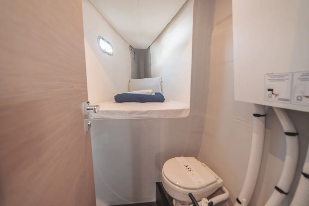 Cabin on Blue Mandarin, a Fountaine Pajot Tanna 47 catamaran at Olbia, Italy