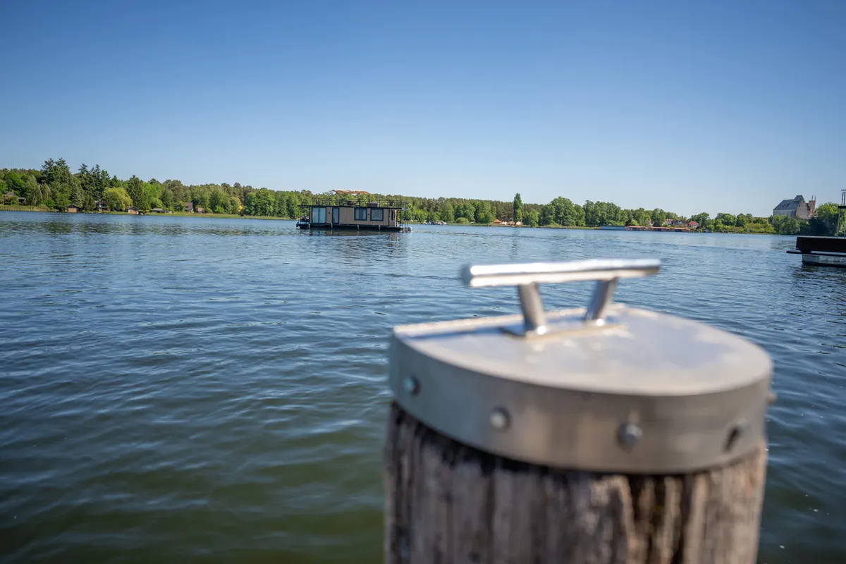 Exterior view of Pina, a Woma D13 motorboat at Fürstenberg/Havel, Germany