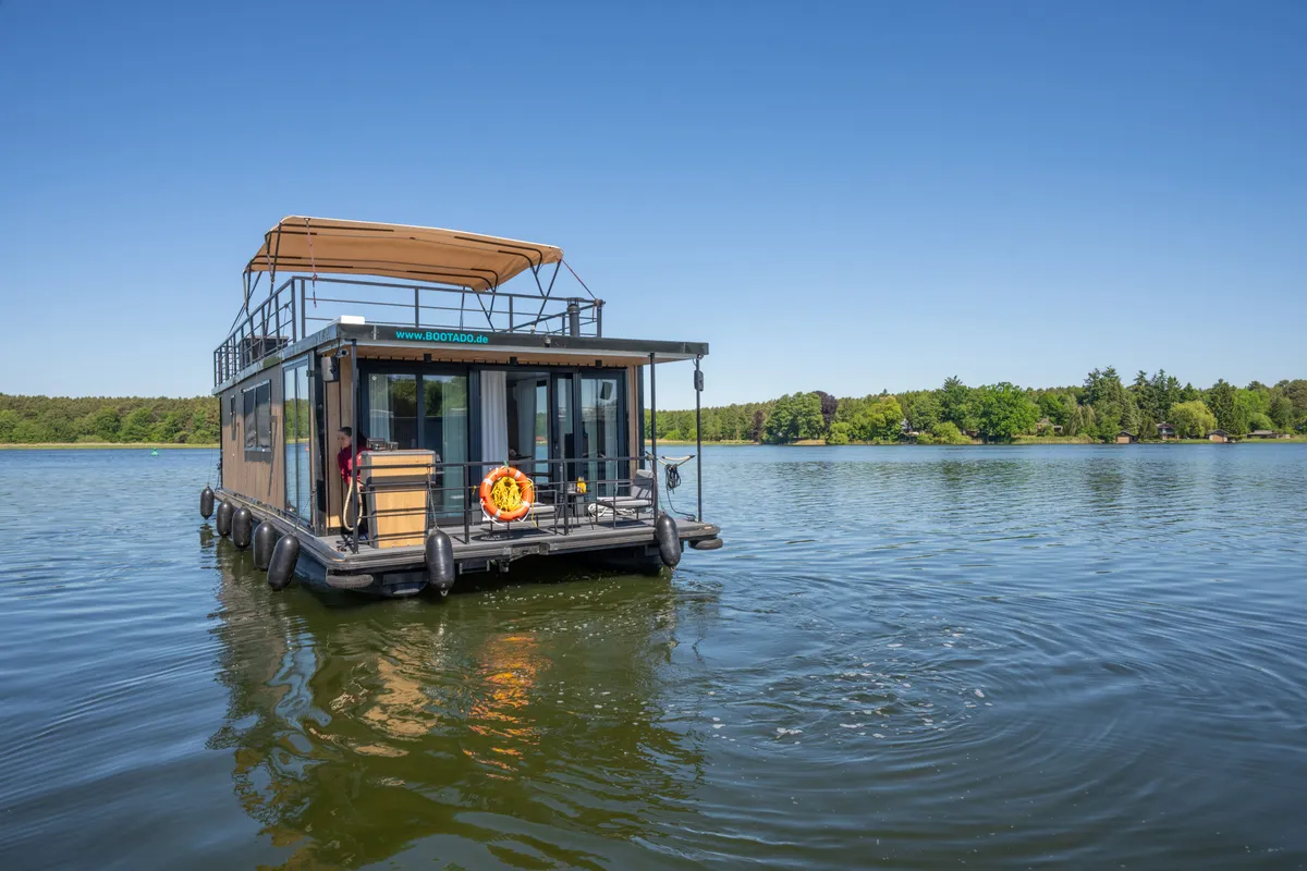 Exterior view of Pina, a Woma D13 motorboat at Fürstenberg/Havel, Germany
