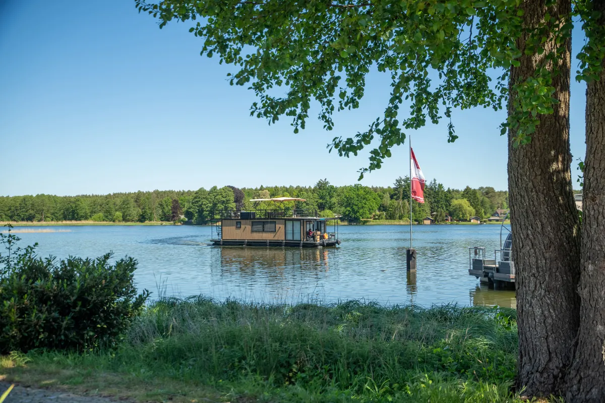 Exterior view of Pina, a Woma D13 motorboat at Fürstenberg/Havel, Germany