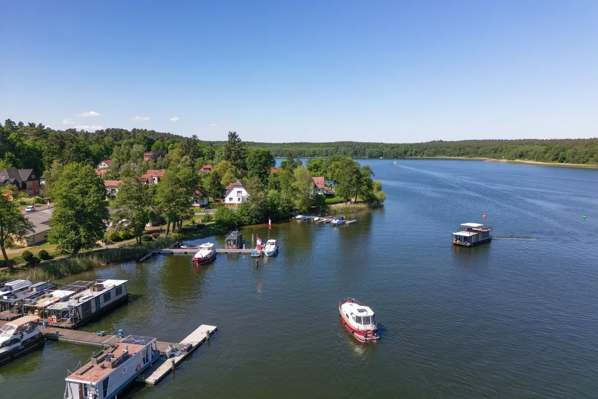 Exterior view of Pina, a Woma D13 motorboat at Fürstenberg/Havel, Germany