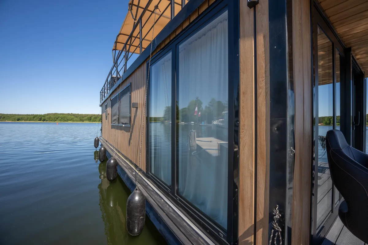 Exterior view of Pina, a Woma D13 motorboat at Fürstenberg/Havel, Germany