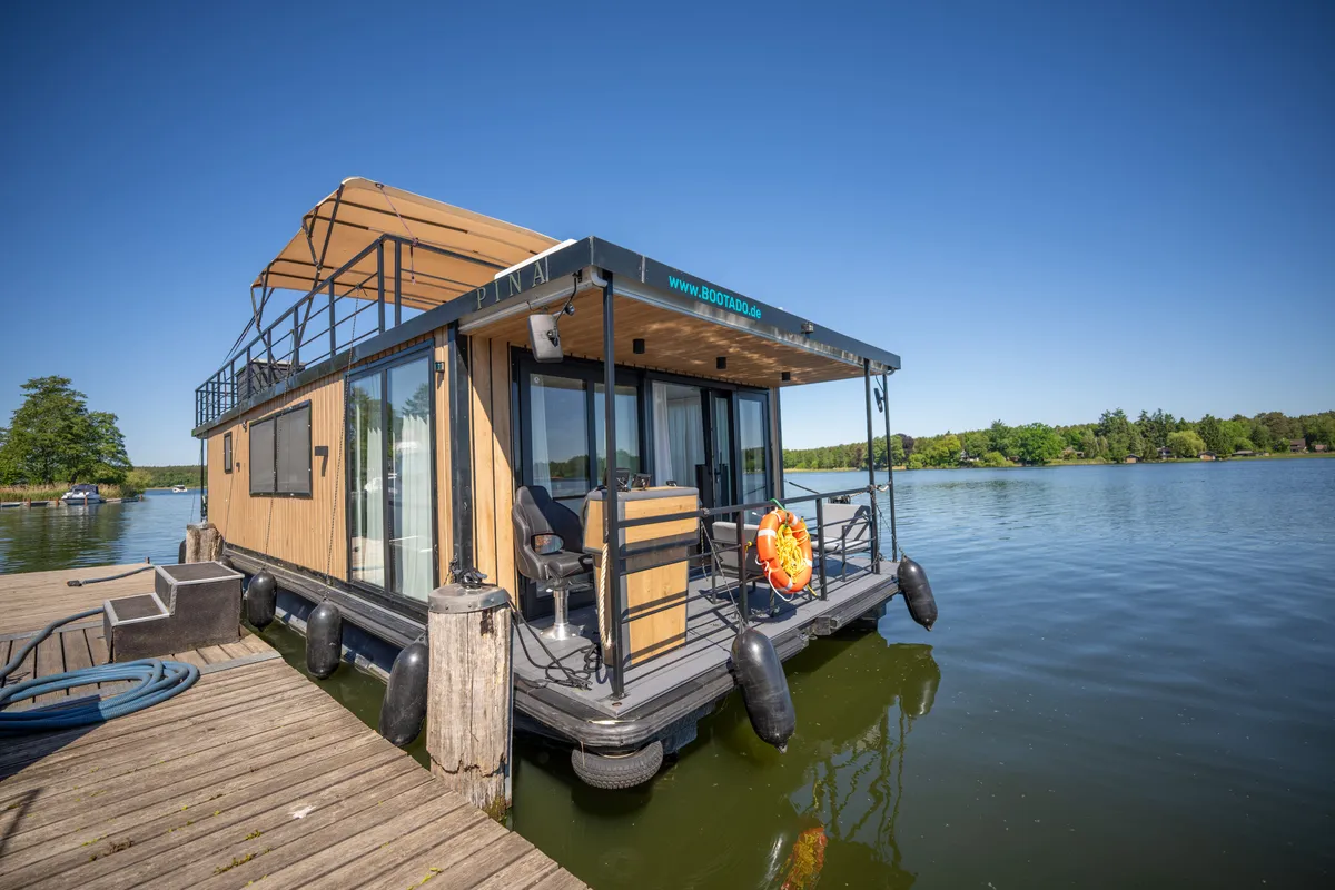 Exterior view of Pina, a Woma D13 motorboat at Fürstenberg/Havel, Germany