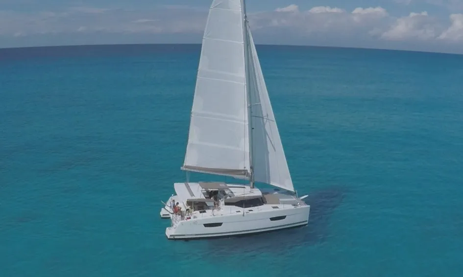 Exterior view of One of Us, a Fountaine Pajot Isla 40 catamaran at Rostock, Germany