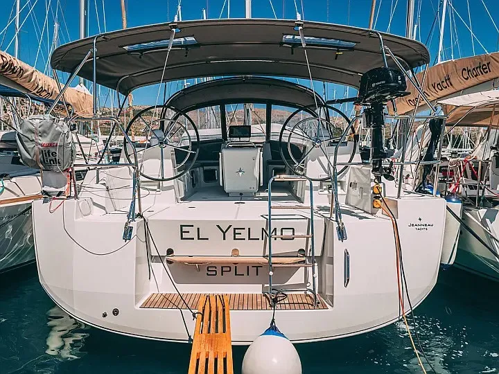 Exterior view of Yelmo, a Jeanneau 54 sailboat at Sant Antoni de Portmany, Spain