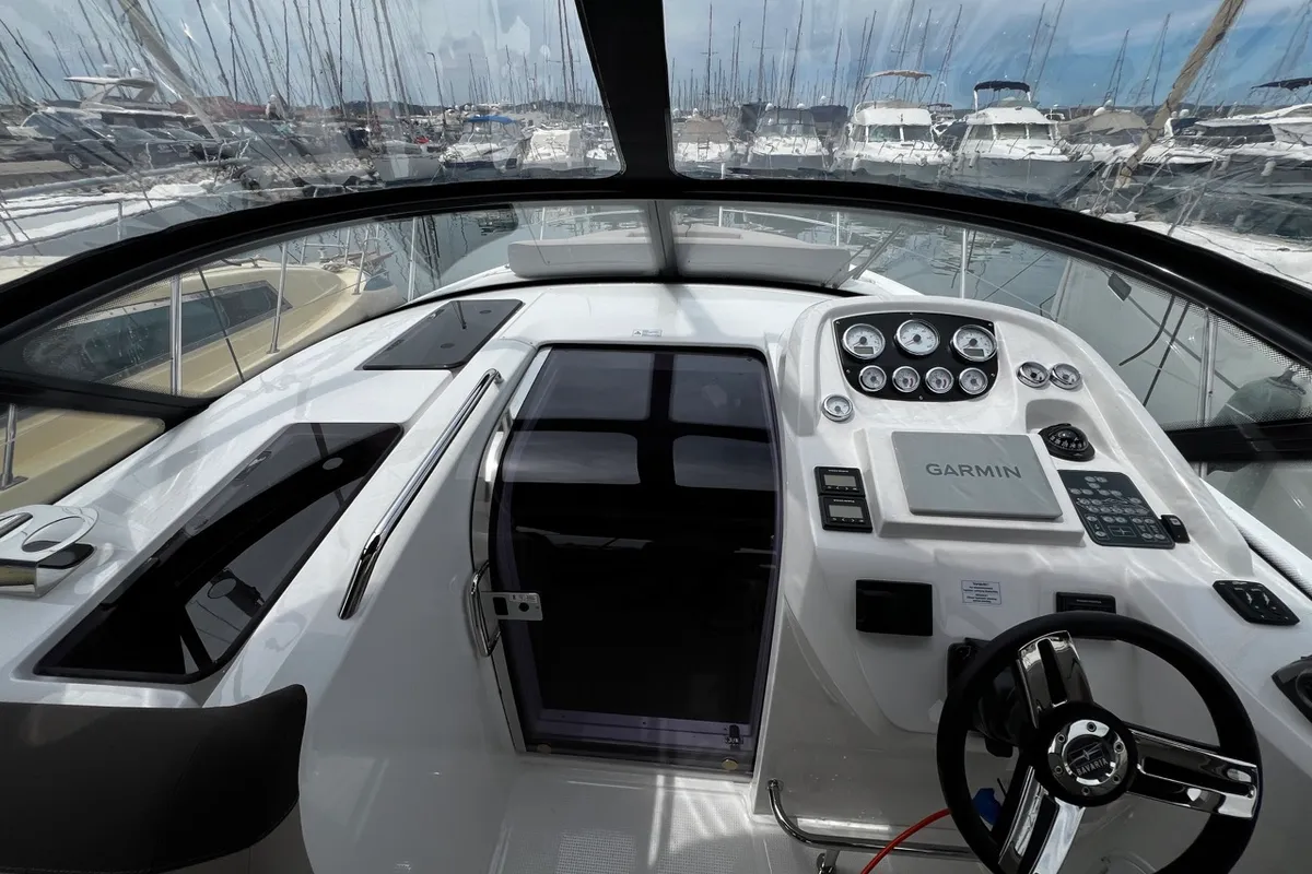 Cockpit of Denver, a Bavaria S29+ motorboat at Grad Pula, Croatia