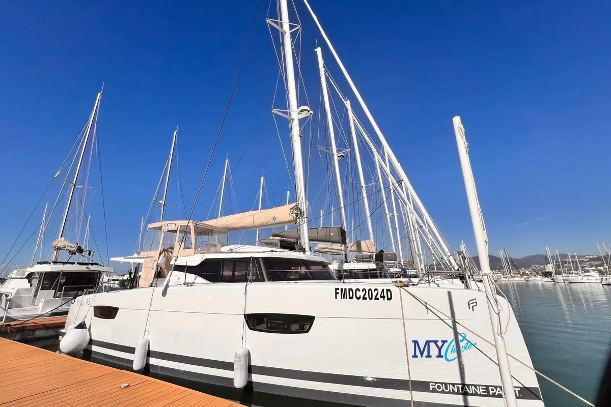 Exterior view of Nami, a Fountaine Pajot Elba 45 catamaran at Salerno, Italy