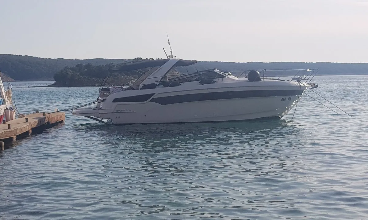 Exterior view of Rhea, a Bavaria Sport 400 Open motor yacht at Punat, Croatia