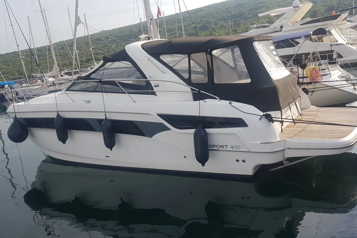 Exterior view of Rhea, a Bavaria Sport 400 Open motor yacht at Punat, Croatia