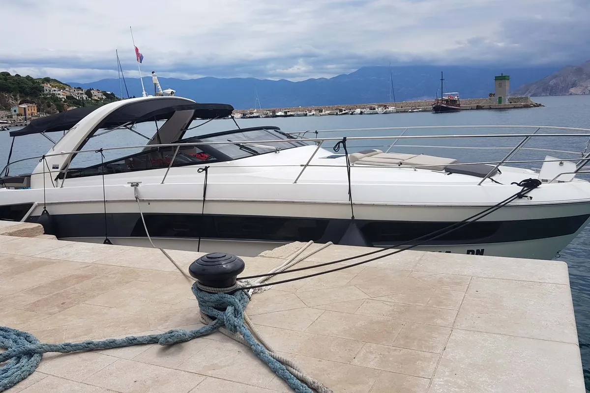 Exterior view of Rhea, a Bavaria Sport 400 Open motor yacht at Punat, Croatia