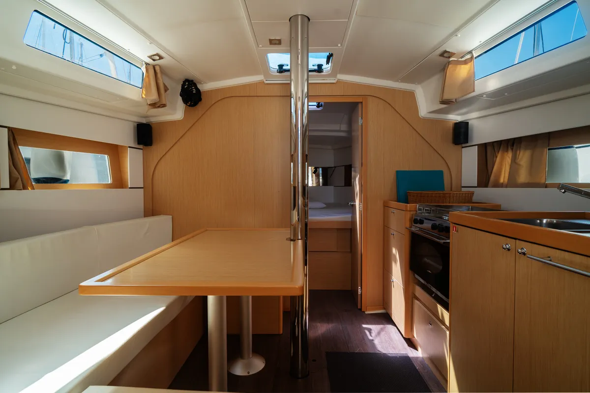 Salon of Marta, a Beneteau Oceanis 38 sailboat at Olbia, Italy