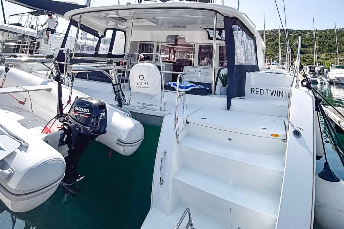 Exterior view of Red Twin II, a Lagoon 450 F catamaran at Primošten, Croatia