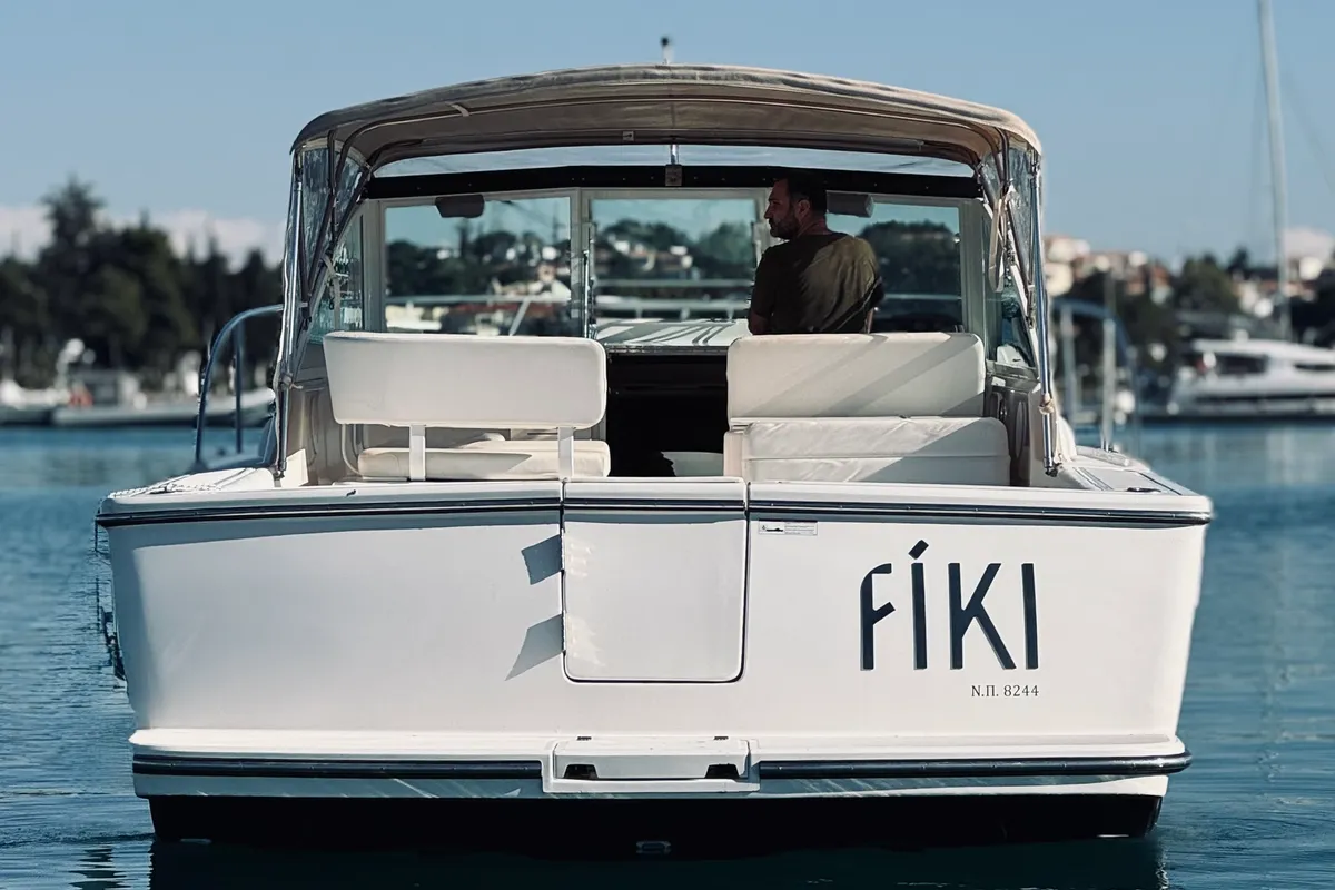 Exterior view of Fiki, a Tiara 2900 Coronet motorboat at Kranidi, Greece