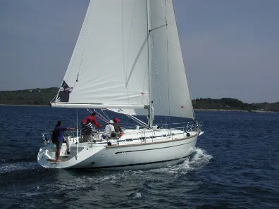 Exterior view of Kokica, a Bavaria 49 sailboat at Grad Trogir, Croatia