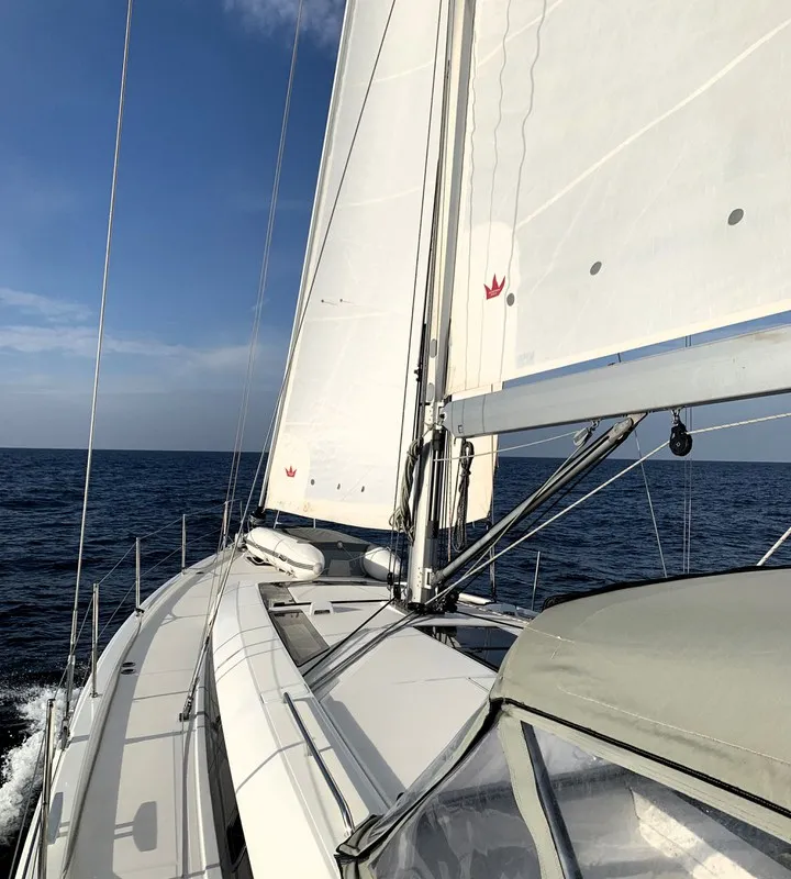 Exterior view of Avocado, a Beneteau Oceanis 51.1 sailboat at Cala Egos, Spain